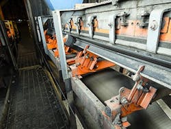 Figure-2.-Installed-in-the-loading-zones-on-each-conveyor-these-create-a-flat-edge-for-improved-containment Figure-2.-Installed-in-the-loading-zones-on-each-conveyor-these-create-a-flat-edge-for-improved-containment