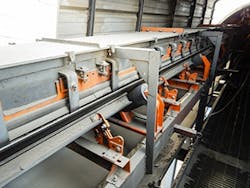 Figure-1.-Upgrade-eliminates-belt-sag-and-improves-sealing-and-includes-belt-cleaning-and-alignment-systems Figure-1.-Upgrade-eliminates-belt-sag-and-improves-sealing-and-includes-belt-cleaning-and-alignment-systems