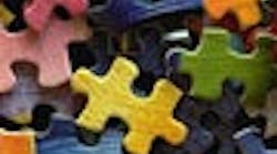 1003_puzzler_button 1003_puzzler_button