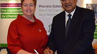 Trish-Kerin-and-Sam-Mannan-signing-the-Process-Safety-for-the-21st-Century
