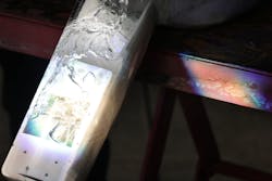 Close-up of the panel with the semiconductor catalyst and water inside. Close-up of the panel with the semiconductor catalyst and water inside.