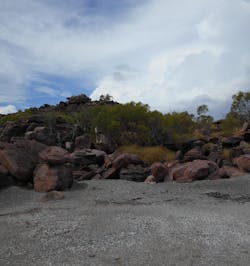 A beach featuring a shell midden — thousands of years of shells discarded after being cooked and eaten. A beach featuring a shell midden — thousands of years of shells discarded after being cooked and eaten.