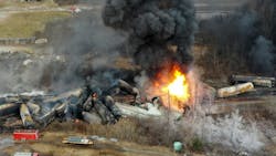 Portions of a Norfolk Southern freight train that derailed Feb. 3 in East Palestine, Ohio, burning the following day. (AP Photo/Gene J. Puskar)