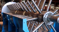 Figure 4: The pin mixer’s visible interior shows the arrangement of pins fabricated and designed for optimal blending retention. Figure 4: The pin mixer’s visible interior shows the arrangement of pins fabricated and designed for optimal blending retention.