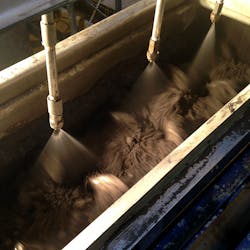 Figure 5: A pugmill mixer is tested in the FEECO Innovation Center. Figure 5: A pugmill mixer is tested in the FEECO Innovation Center.