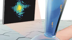 An intense X-ray beam (in pink) is focused into a small spot on a single nanoscale grain of a platinum electrode (highlighted within the droplet). Diffraction interference patterns from that grain were collected on an X-ray detector (the black screen). (Illustration by Dina Sheyfer, Argonne National Laboratory.)