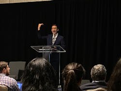Thomas Kwan, director of sustainability research for Schneider Electric, addresses attendees at the World Chemical Forum in Houston on Sept. 12.