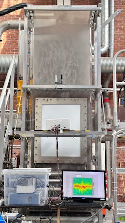 Figure 1. The Chalmers fluidized bed set up. The screen shows a real-time color map indicating the power intensity received, proportional to the solids concentration, and the velocity of the particles. Figure 1. The Chalmers fluidized bed set up. The screen shows a real-time color map indicating the power intensity received, proportional to the solids concentration, and the velocity of the particles.