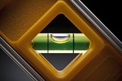 Leveling tool on a dark background Leveling tool on a dark background