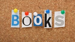 The word books thumbtacked to corkboard The word books thumbtacked to corkboard