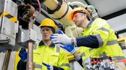 Engineer working wearing personal protection equipment PPE, hard hat and other safety apparel