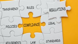 Jigsaw puzzle with the words compliance and regulations missing Jigsaw puzzle with the words compliance and regulations missing