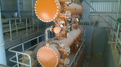 Examples of shell and tube heat exchangers with their nozzles during construction. Examples of shell and tube heat exchangers with their nozzles during construction.