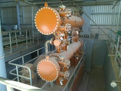 Figure 1. Example of shell and tube heat exchangers with their nozzles during construction. Figure 1. Example of shell and tube heat exchangers with their nozzles during construction.