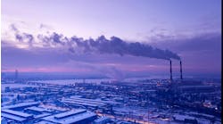 Smoke stacks emitting harmful emissions into the atmosphere causing global warming. Smoke stacks emitting harmful emissions into the atmosphere causing global warming.