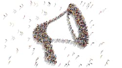 Large group of people seen from above gathered together as a megaphone symbol