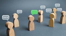 wooden people cutouts with speech bubbles above their heads