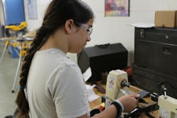 Campers learned to work on various equipment found in manufacturing settings, including manual lathes. Campers learned to work on various equipment found in manufacturing settings, including manual lathes.