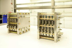 Figure 1. The two-step system for carbon dioxide (CO2) electrolysis works by converting CO2 into carbon monoxide (CO), then processing CO into multi-carbon products such as ethylene and acetate. Figure 1. The two-step system for carbon dioxide (CO2) electrolysis works by converting CO2 into carbon monoxide (CO), then processing CO into multi-carbon products such as ethylene and acetate.