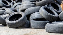 pile of discarded tires pile of discarded tires
