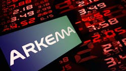 Arkema logo on smartphone display with red digital stock numbers in background Arkema logo on smartphone display with red digital stock numbers in background