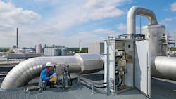 engineer using gas analysis and flow measurement technology engineer using gas analysis and flow measurement technology