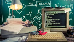 an early personal computer with hard disks drives and dot matrix printer paper and equations written on a chalkboard in the background an early personal computer with hard disks drives and dot matrix printer paper and equations written on a chalkboard in the background