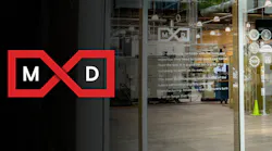 MxD logo in front of their facility