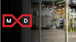MxD logo in front of their facility MxD logo in front of their facility