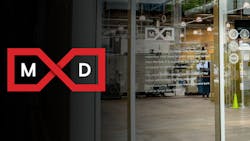 MxD logo in front of their facility MxD logo in front of their facility