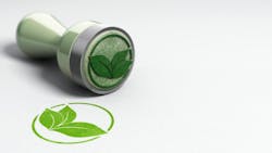 Rubber stamp over paper background with leaves symbol printed on it. Rubber stamp over paper background with leaves symbol printed on it.