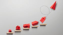 Wooden steps with different stages of making a paper airplane, creating something from nothing success concept Wooden steps with different stages of making a paper airplane, creating something from nothing success concept