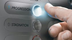 Man pushing an elevator button where it is written he words progression, stagnation and regression. Man pushing an elevator button where it is written he words progression, stagnation and regression.