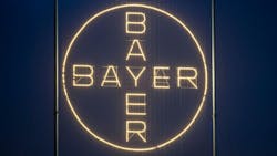 The Bayer logo, shines on the company's site in Leverkusen. The Bayer logo, shines on the company's site in Leverkusen.