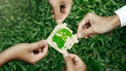 hands hold puzzle pieces that put together to show globe representing sustainability hands hold puzzle pieces that put together to show globe representing sustainability