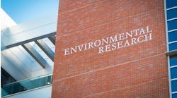 Tall brick building featuring Tall brick building featuring