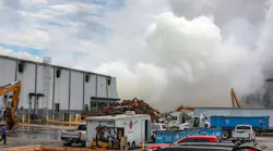 A large plume caused by a chemical reaction is visible over the BioLab facility in Conyers, Georgia, where a fire broke out Sept. 29, 2024.