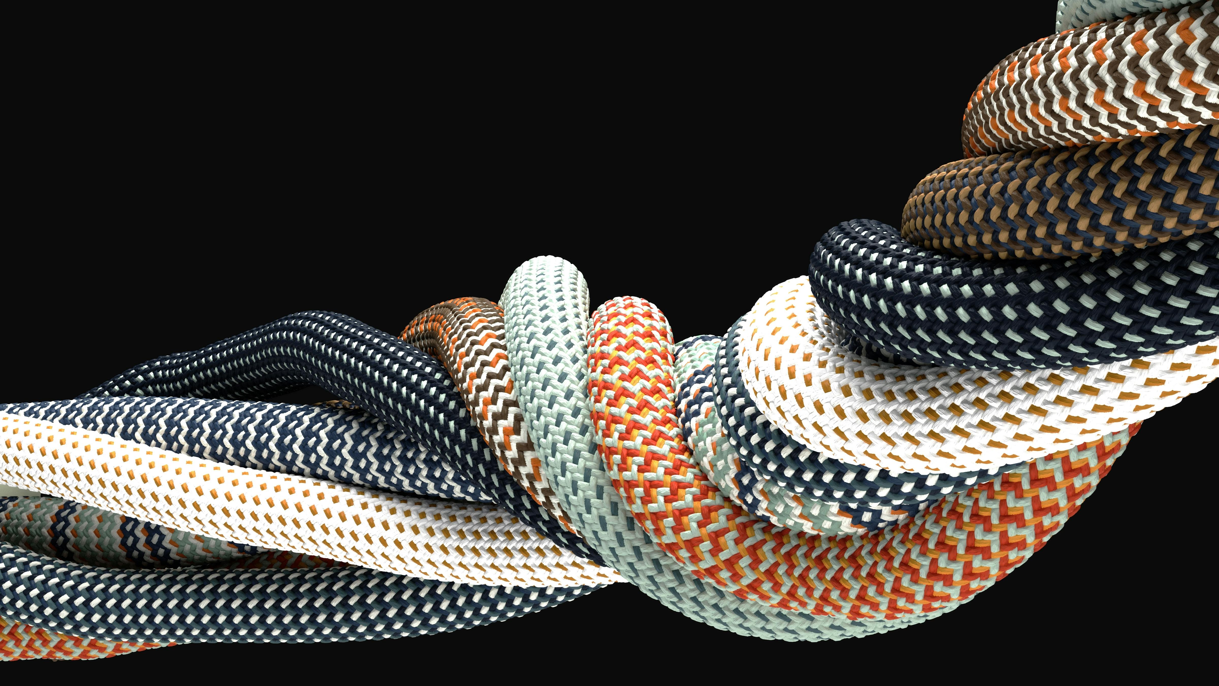 braided synthetic cables with textile coating on black background