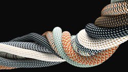 braided synthetic cables with textile coating on black background braided synthetic cables with textile coating on black background