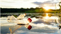 Plastic waste in lake. Plastic waste in lake.