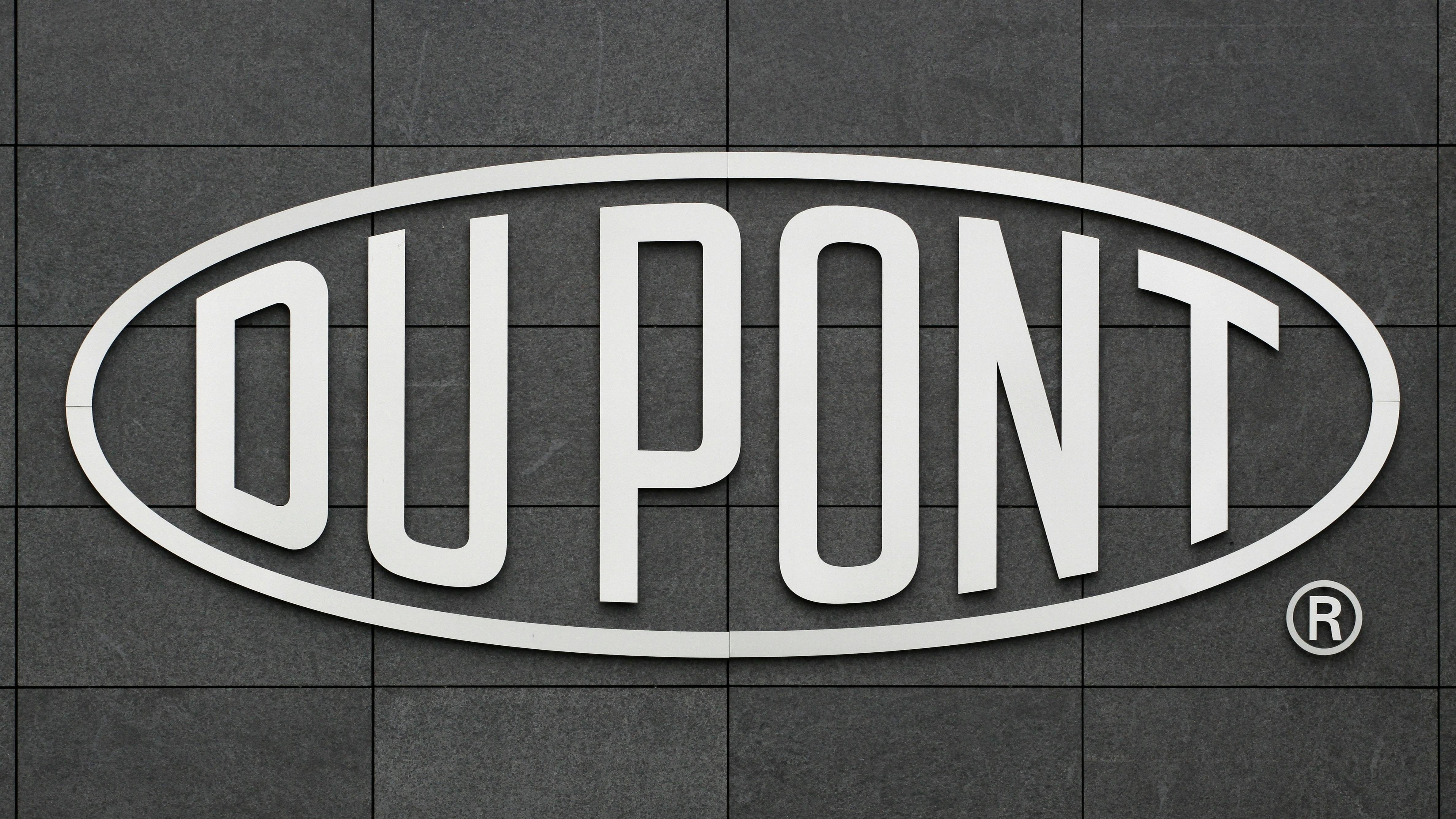DuPont logo on a wall.