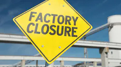 A sign with the word 'FACTORY CLOSURE'