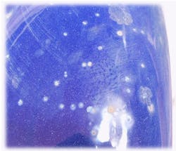 Shown is the tell-tale sign of pin-hole damage to glass-lined steel equipment. Shown is the tell-tale sign of pin-hole damage to glass-lined steel equipment.