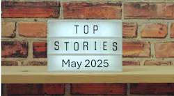 Top stories May 2025 marquee style sign against a brick wall