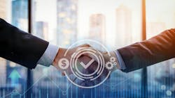 Two business professionals in formal attire shaking hands across a table, symbolizing partnership or successful agreement in a modern office setting. Two business professionals in formal attire shaking hands across a table, symbolizing partnership or successful agreement in a modern office setting.