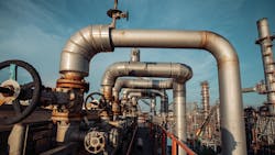 pipes and valves in a chemical plant pipes and valves in a chemical plant