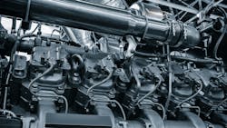 black and white photo of large industrial diesel engine black and white photo of large industrial diesel engine