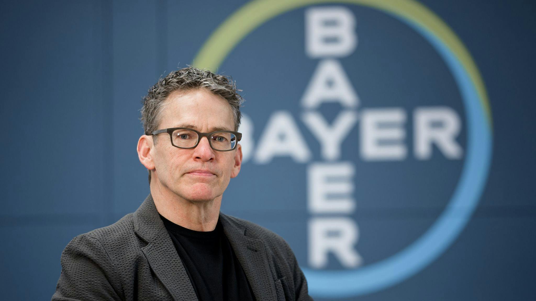 Bill Anderson, Chairman of the Board of Management of Bayer AG, sits during a photo session at the company's headquarters.