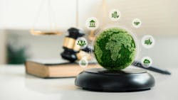 world and wooden gavel with a golden scale for law international environmental concept of business corporate and industry. world and wooden gavel with a golden scale for law international environmental concept of business corporate and industry.