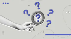magnifying glass hovers over 1 of 5 question marks